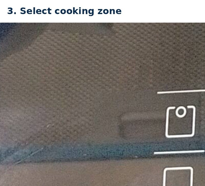 Buttons to select upper or lower cooking zone